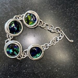Black Opal bracelet handcrafted in silver. Adjustable length.
